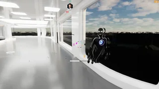 A black drone hovering by a window